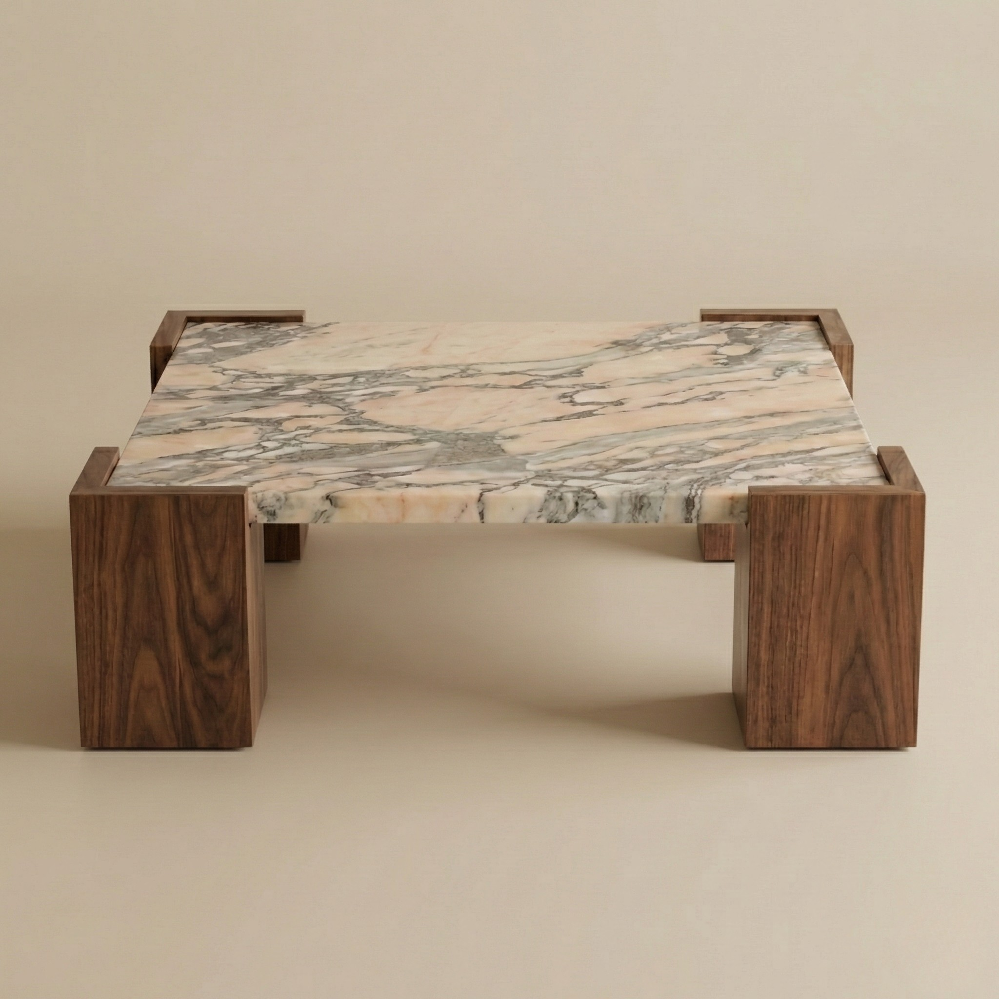 Coffee table with marble top and wooden frame on a beige background