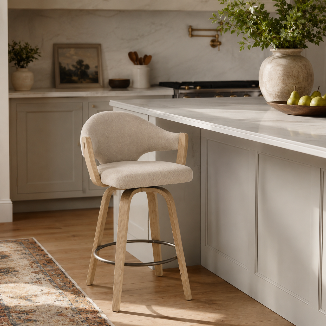 Beige bar stool in a kitchen setting with a light-colored countertop and cabinets.