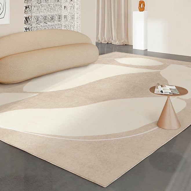 Almond Curves Art Rug styled in a modern living room with soft beige abstract shapes and curved lines