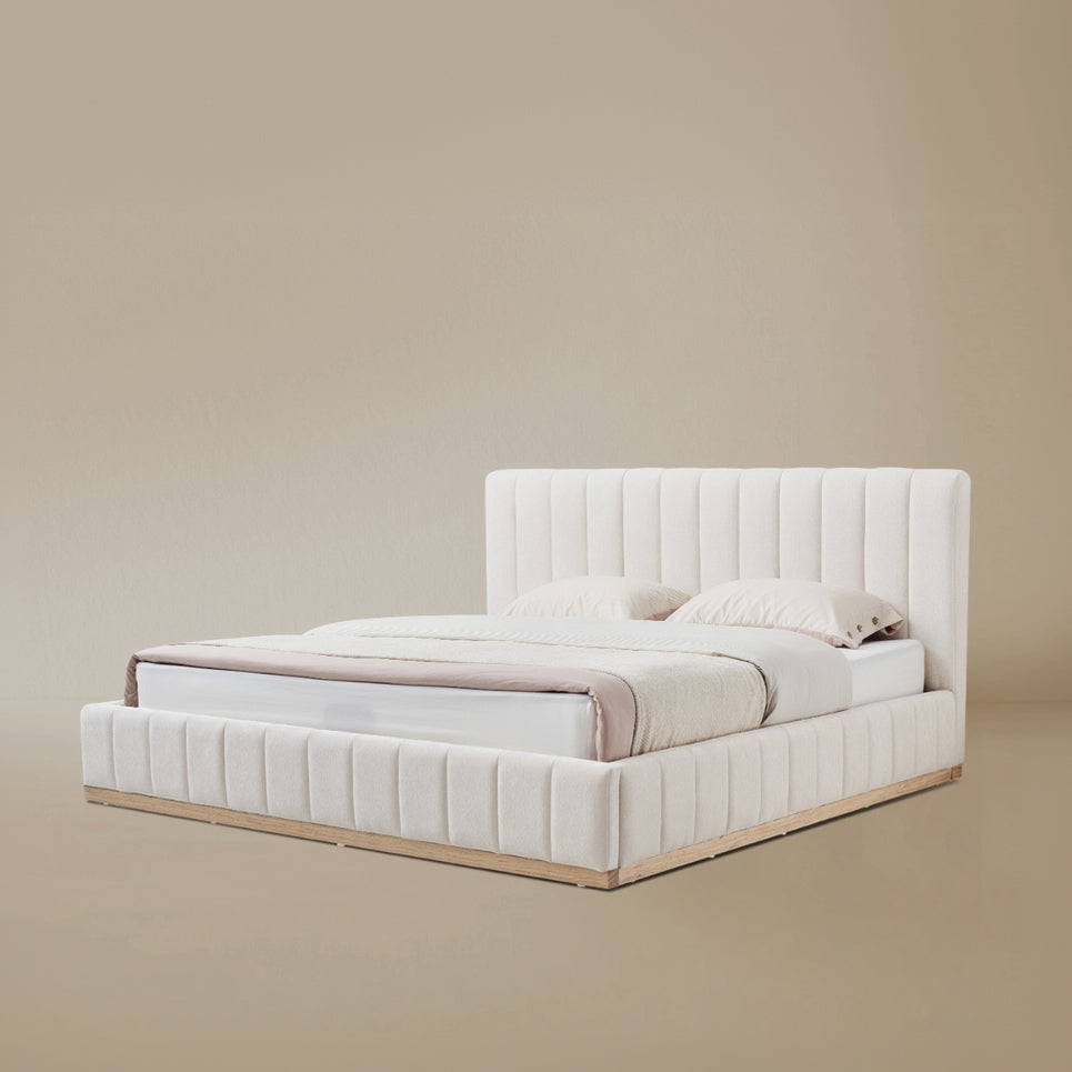Angle view of the Alora Beige linen bed with ash wooden frame against a beige background