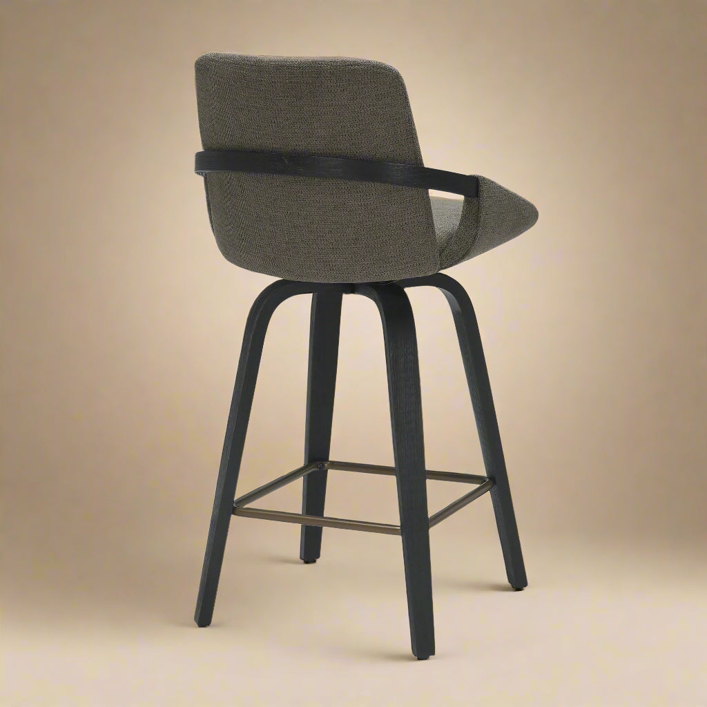 Back view of the black Alpine Swivel Counter Stool showing the curved arms and wood frame