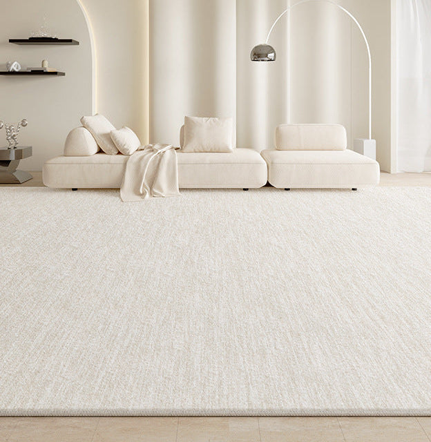 Amelia Rug in a modern beige living room with a large cream sectional sofa and soft natural lighting