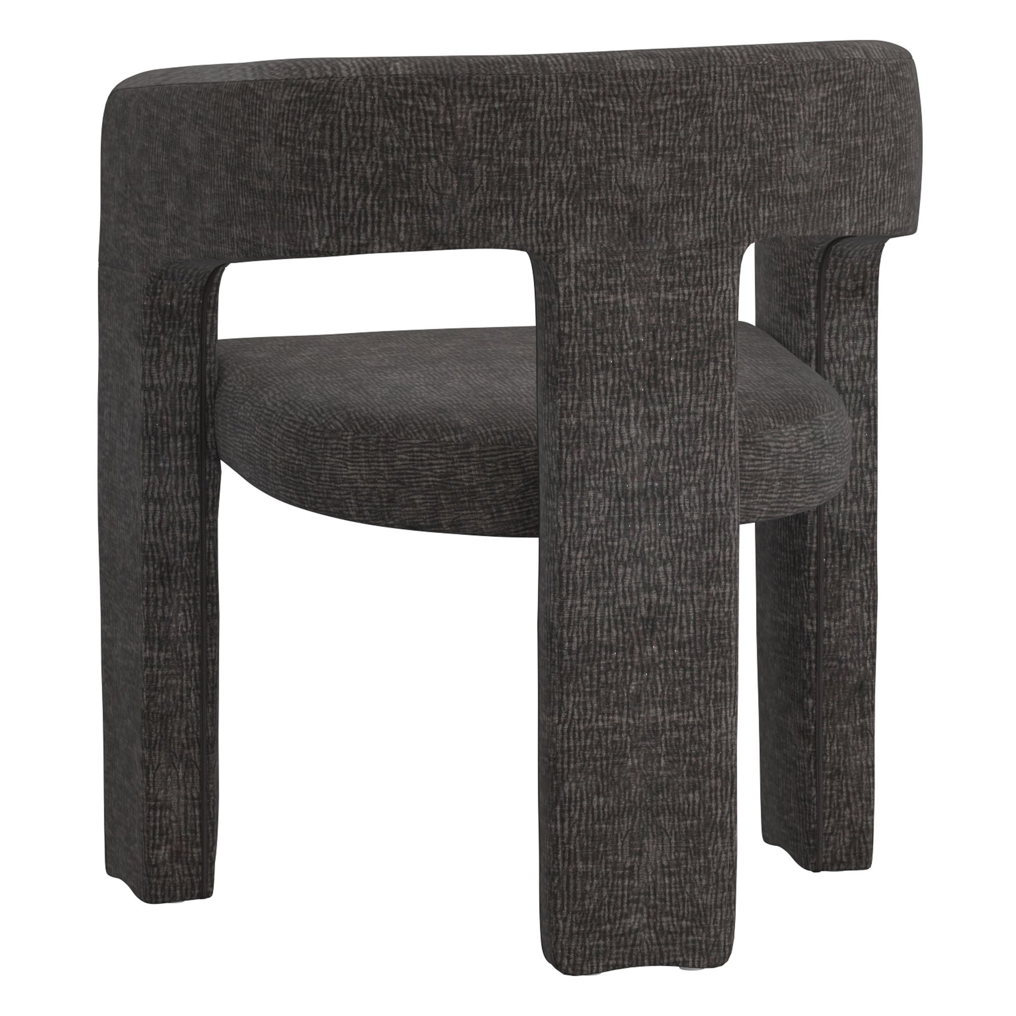 Back view of the modern dark grey Archway dining chair revealing its striking sculptural design with a thick central back leg.