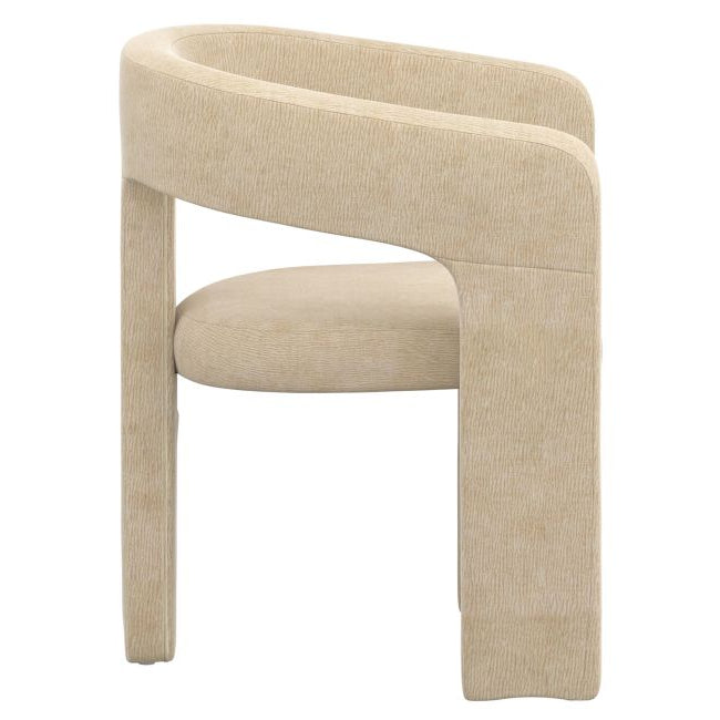 Side profile of the beige Archway dining chair showcasing its unique architectural leg design and continuous curved backrest.