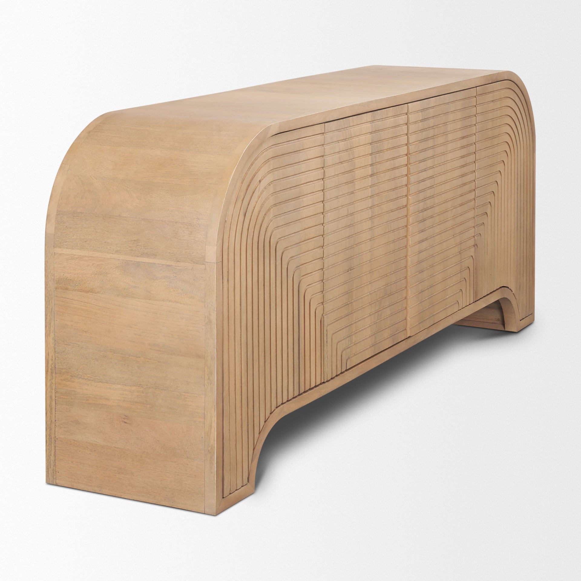 Angled view of Arco mango wood sideboard showing the rounded waterfall edge design and geometric fluting.