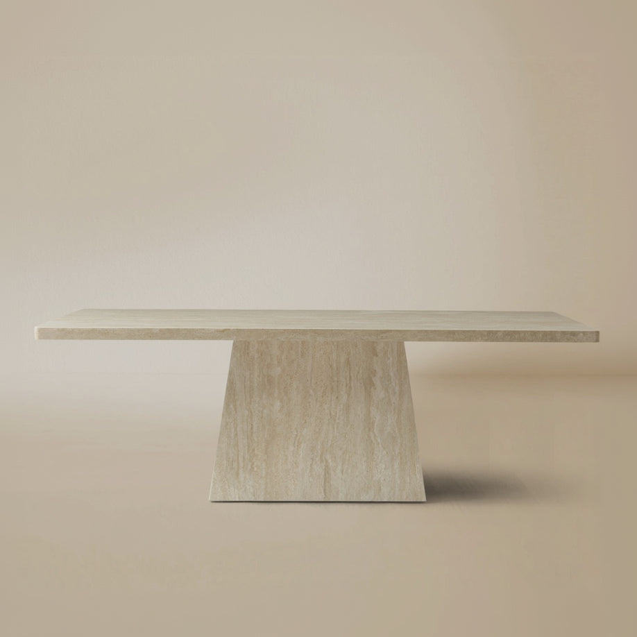 Front view of the Ardella travertine-look sintered stone dining table