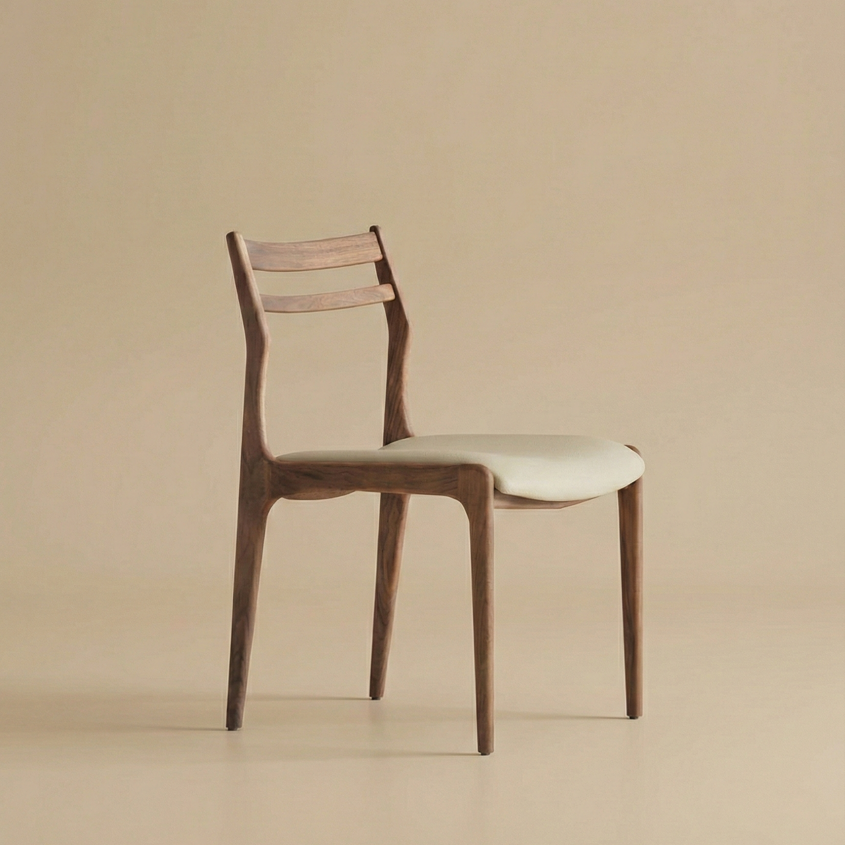 Wooden chair with a white faux leather cushion on a beige background