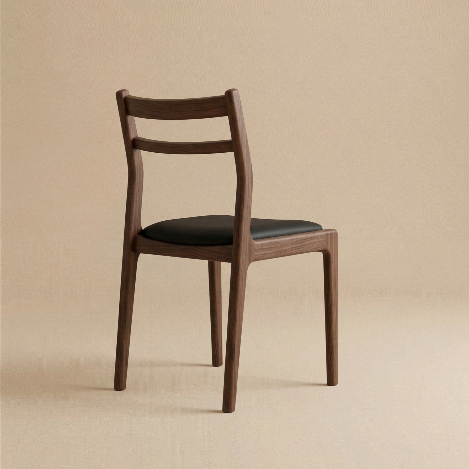 Back view of the Aspen classic dining chair showing the tapered wooden legs and curved back frame in a rich dark wood finish.