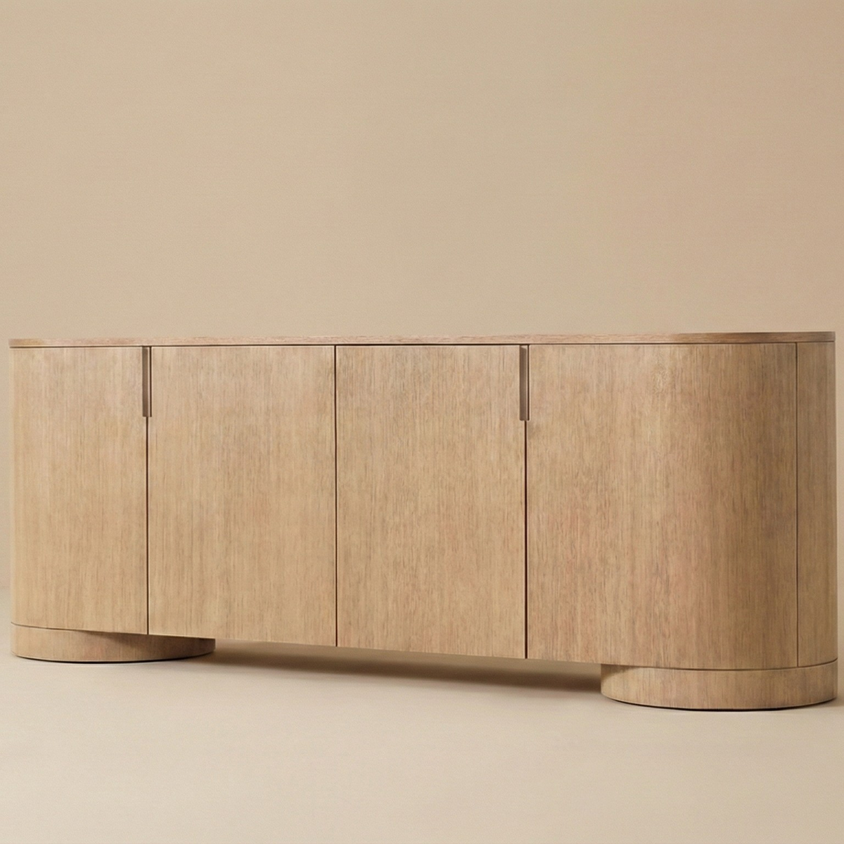 Aurelian Oak Sideboard featuring a modern pill-shaped silhouette with curved ends and thick cylinder legs
