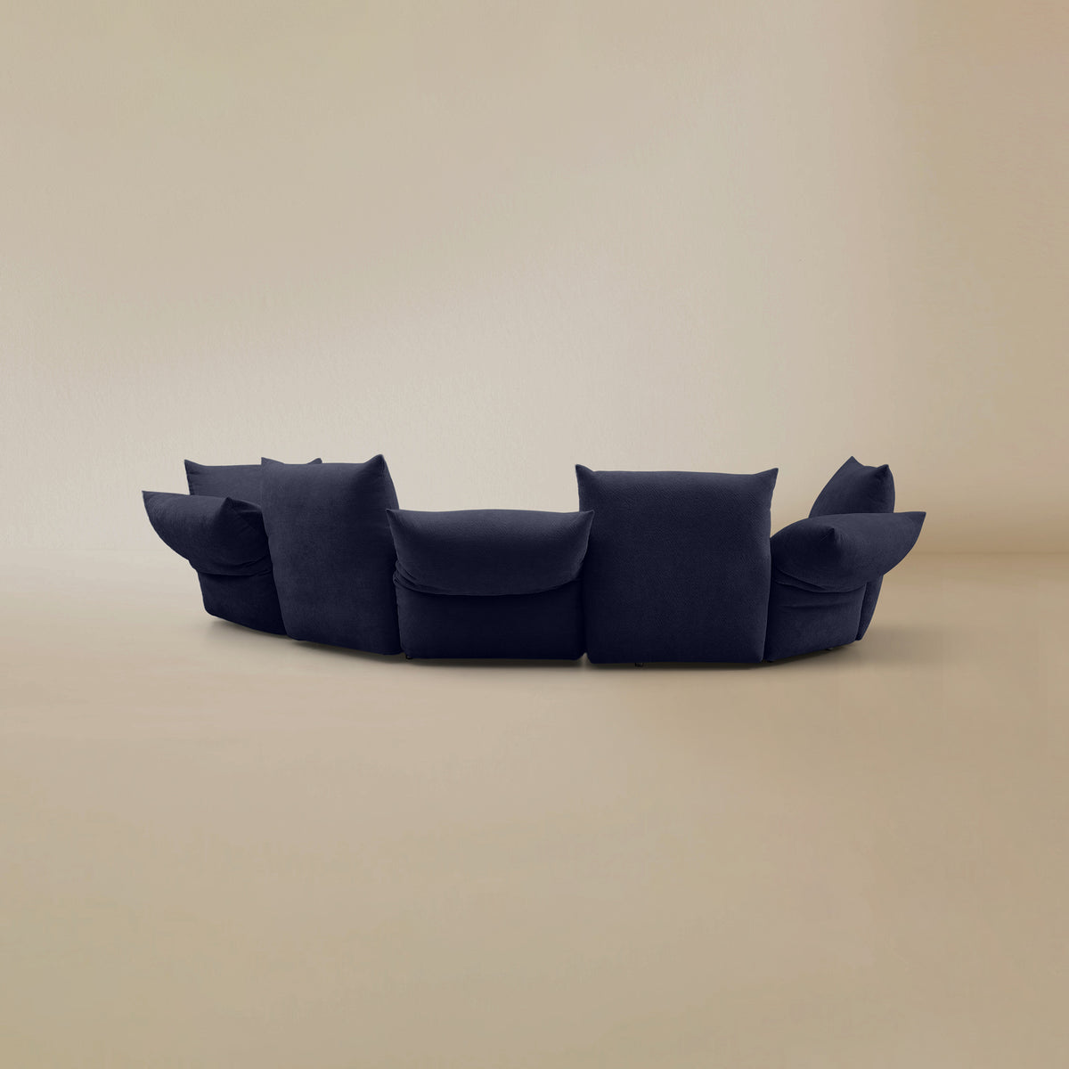 Back view of the Blooming Embrace Modular Sofa, Combo A, in Serenity Blue chenille on a beige studio background