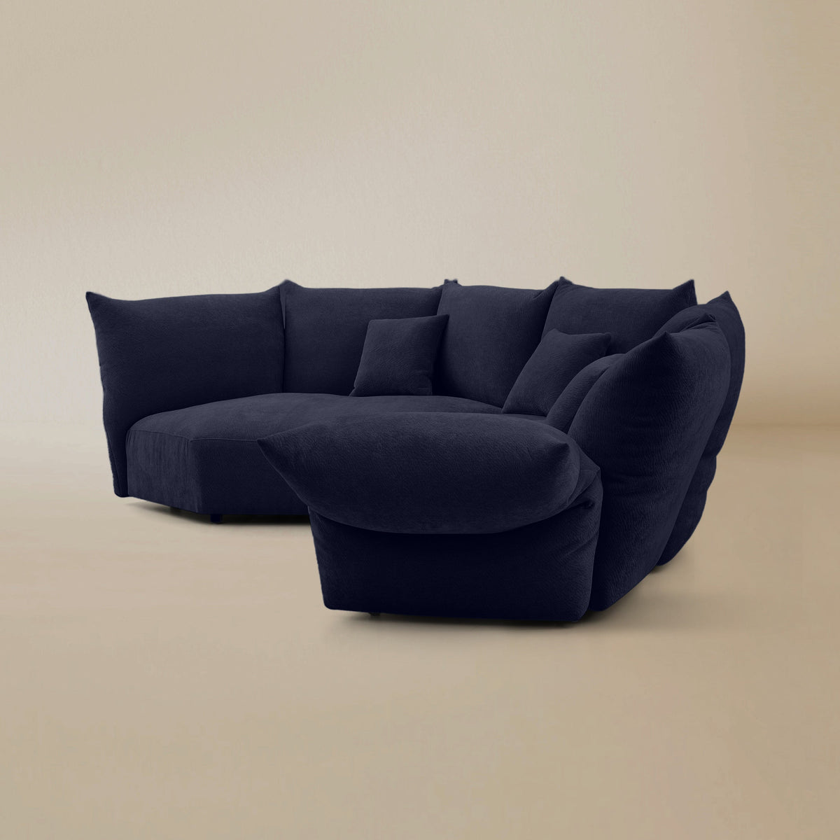 Side view of the Blooming Embrace Modular Sofa, Combo A, in Serenity Blue chenille on a beige studio background