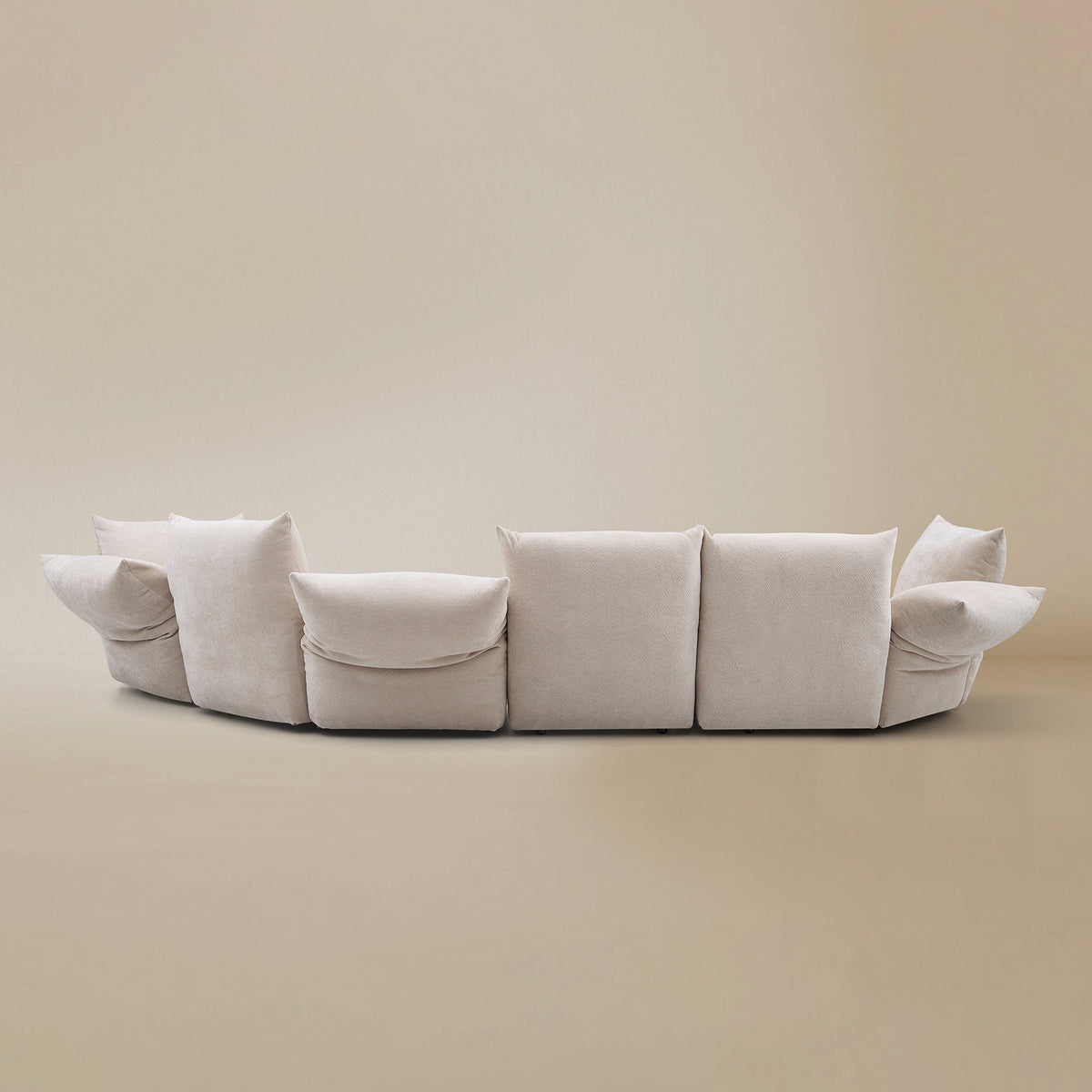 Back view of the Blooming Embrace Modular Sofa, Combo C, in Pearl White chenille on a beige studio background
