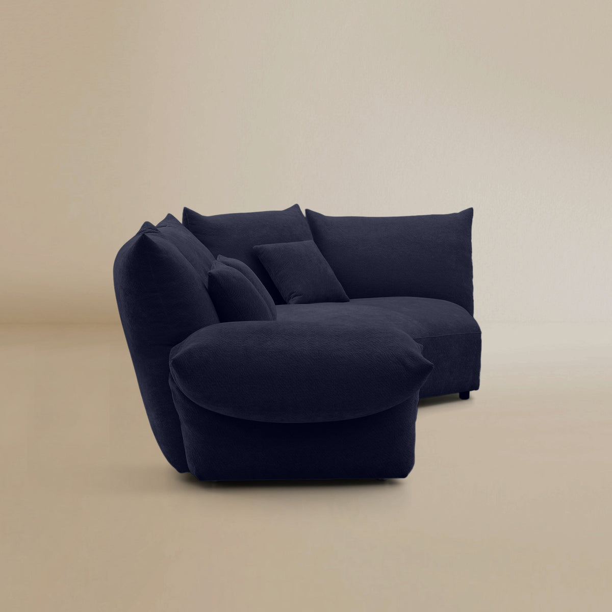 Side view of the Blooming Embrace Modular Sofa, Large Chaise with Two Seater, in Serenity Blue chenille on a beige studio background