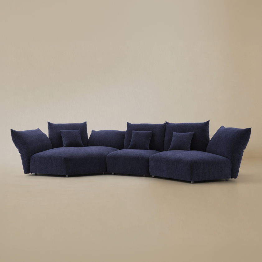 Blue sofa on a beige background.