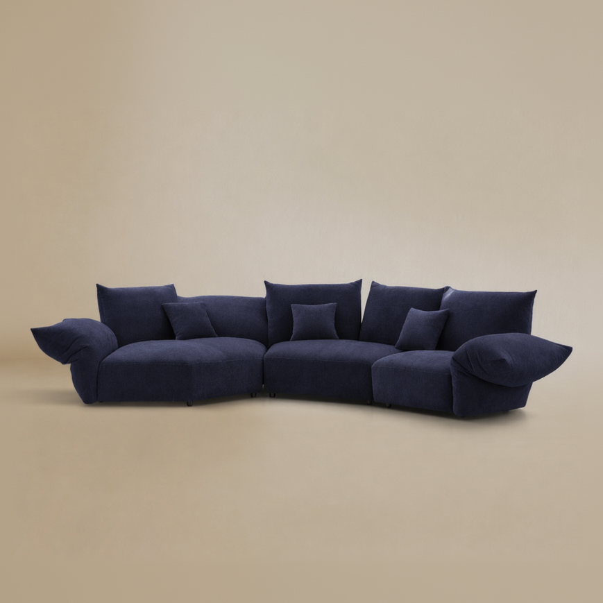 Navy blue sectional sofa on a beige background