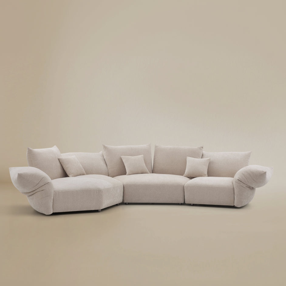 Front view of the modular blooming embrace sofa in pearl white chenille fabric