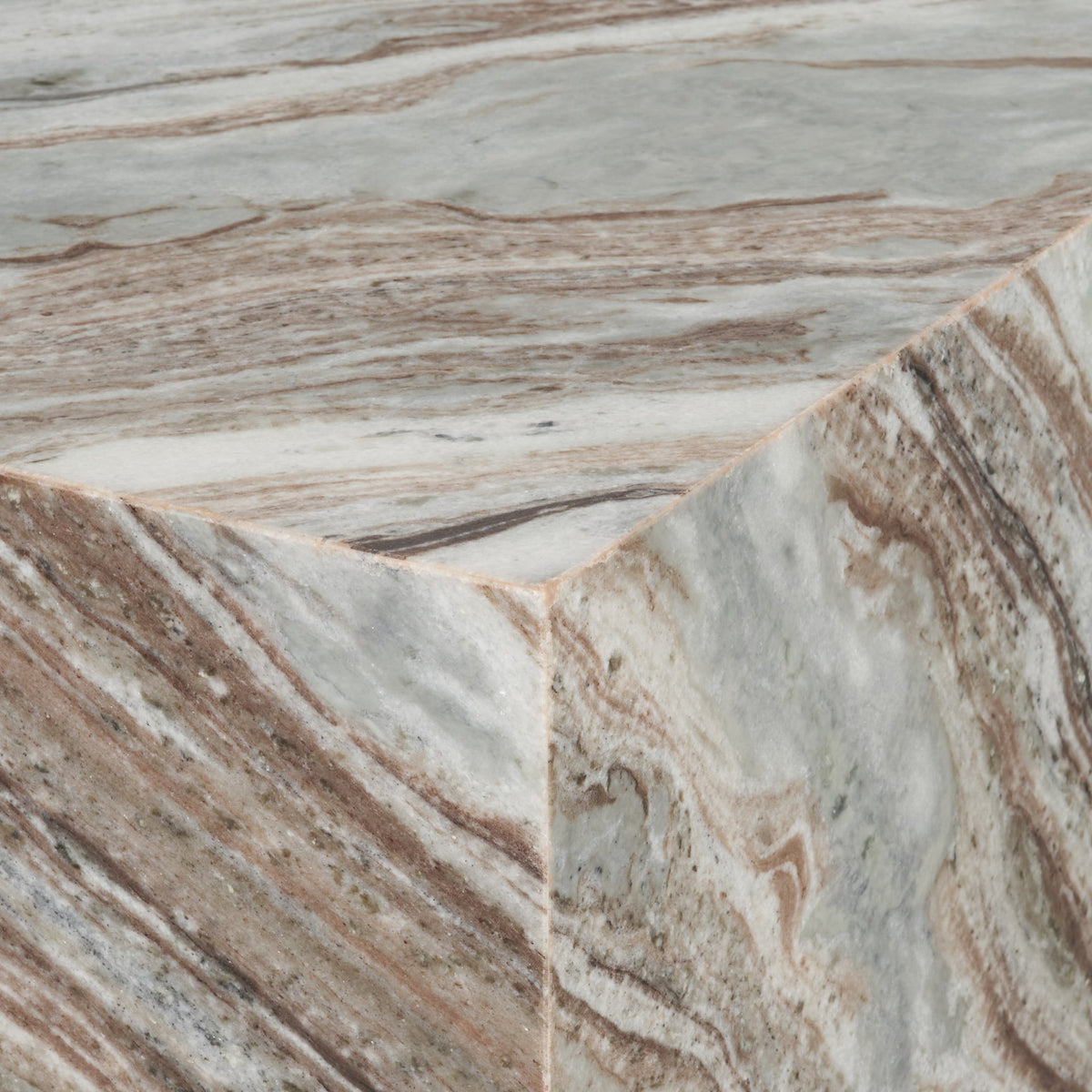 Close-up corner view of the Calista Marble Plinth Coffee Table showing the polished marble edge and continuous veining.