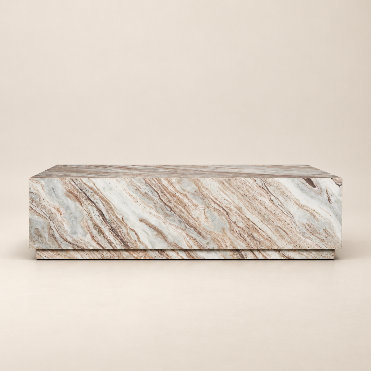 Front studio view of the Calista Marble Plinth Coffee Table with warm cream and rust-toned natural marble veining on a beige background.