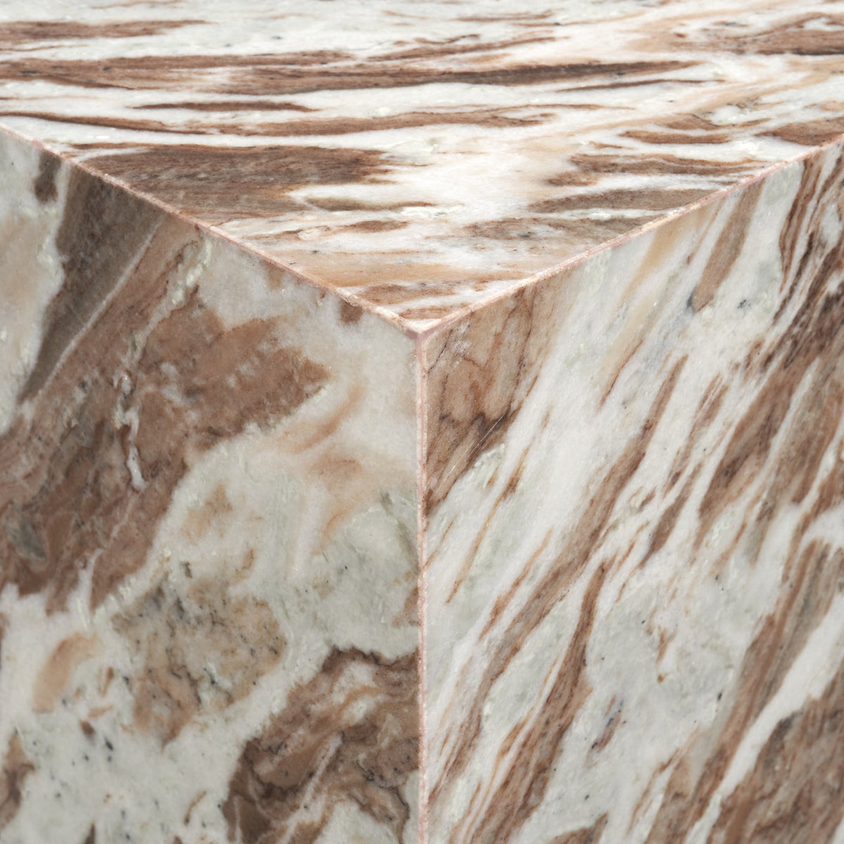 Close-up corner view of the Calista Marble Plinth Side Table showing the polished marble edge and continuous natural veining.