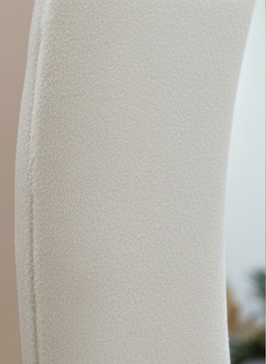 Close-up detail of the Cloud-shape Full Body Mirror’s textured white frame.
