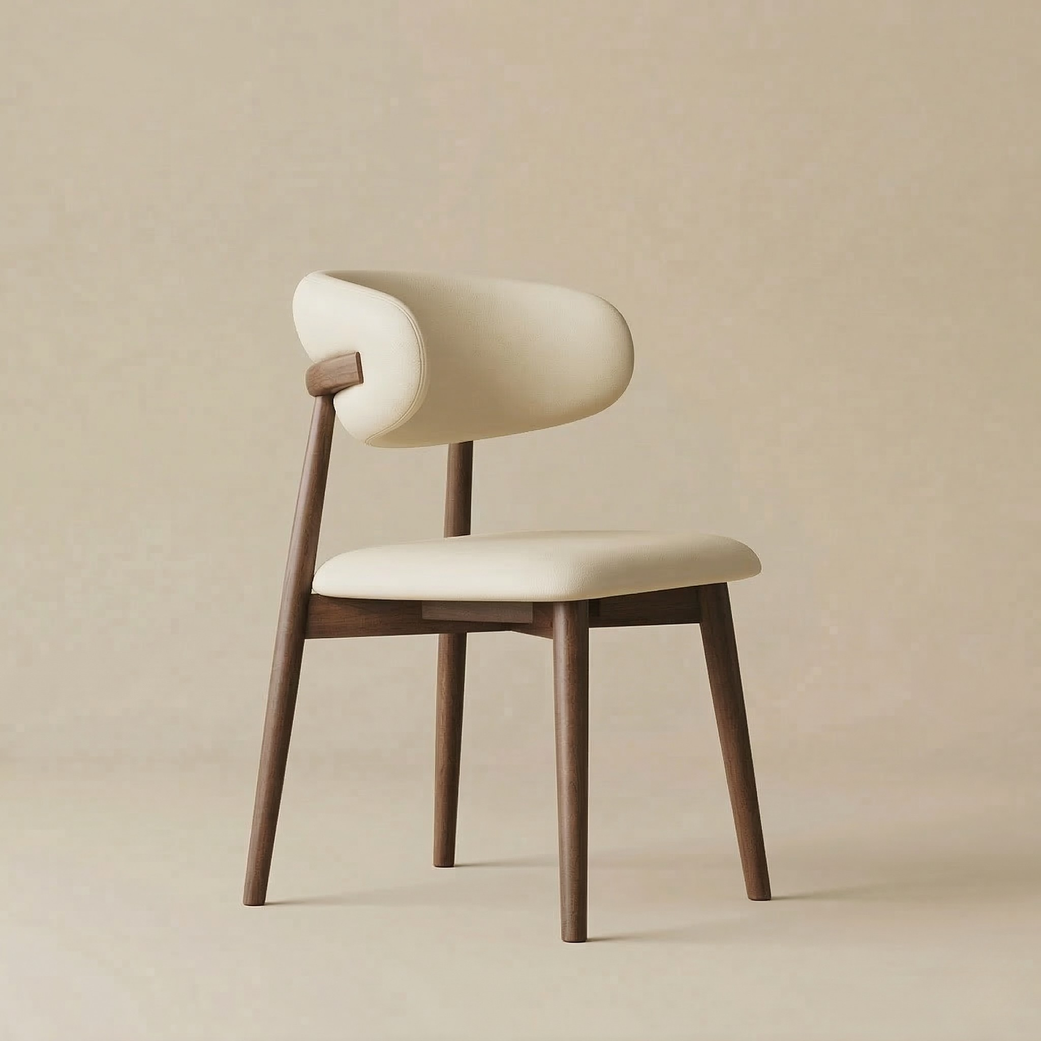 Angled view of the Modern Leather Ash Wood Dining Chair highlighting the unique wrap-around backrest and tapered wooden legs.