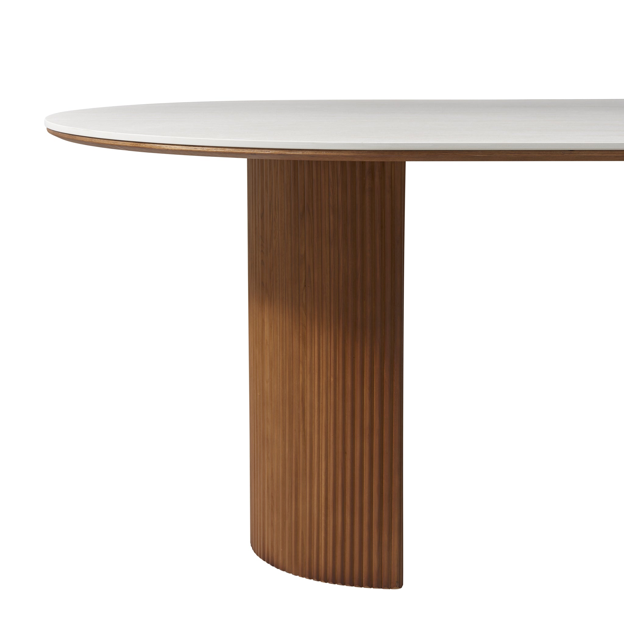 Close-up of the Crescent Grove Dining Table’s fluted wood pedestal base