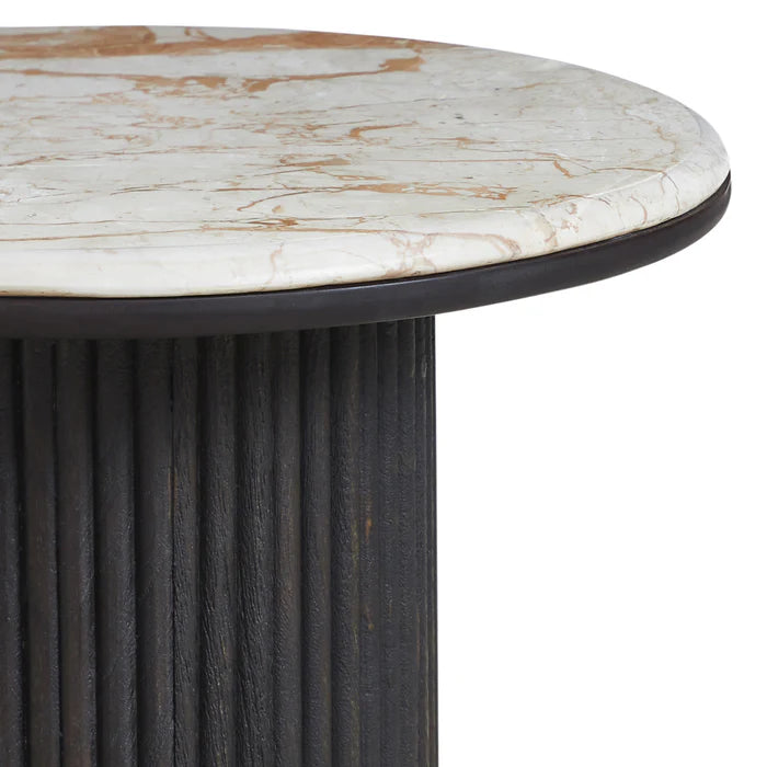 Round table with marble top and dark cylindrical base