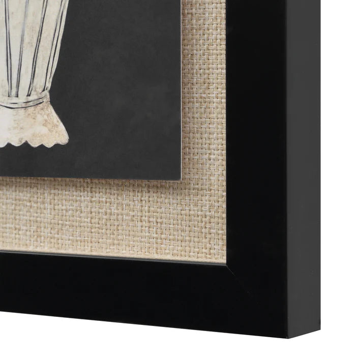 Macro close-up of the sleek black frame and natural woven burlap-style matting on the Daphne botanical wall art.