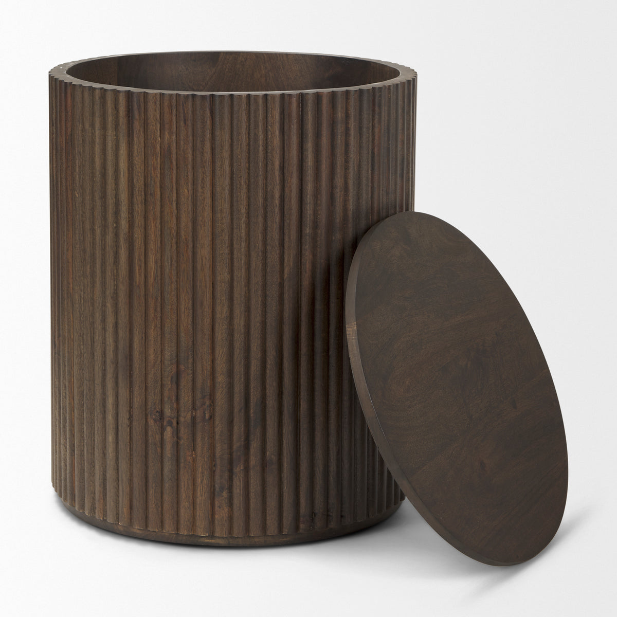 The Eleanor dark wood fluted side table with its round lid removed and leaning against the base, revealing hidden storage.