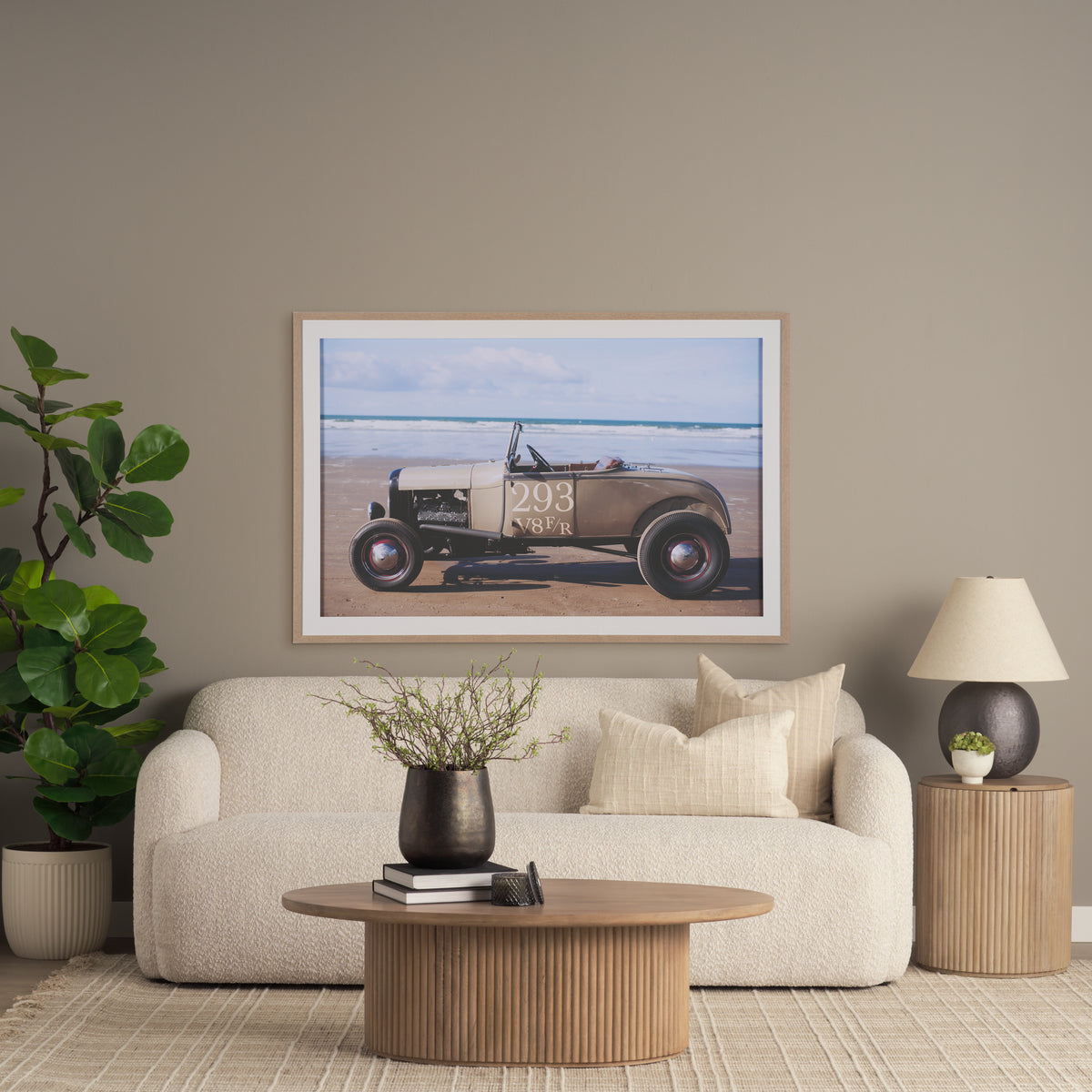 The Eleanor natural mango wood fluted side table styled next to a cream sofa in a bright, modern living room.