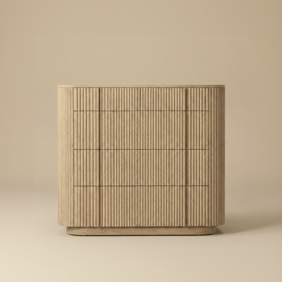 Elias wide oak dresser featuring continuous vertical fluting, rounded corners, and spacious storage drawers for a modern organic bedroom