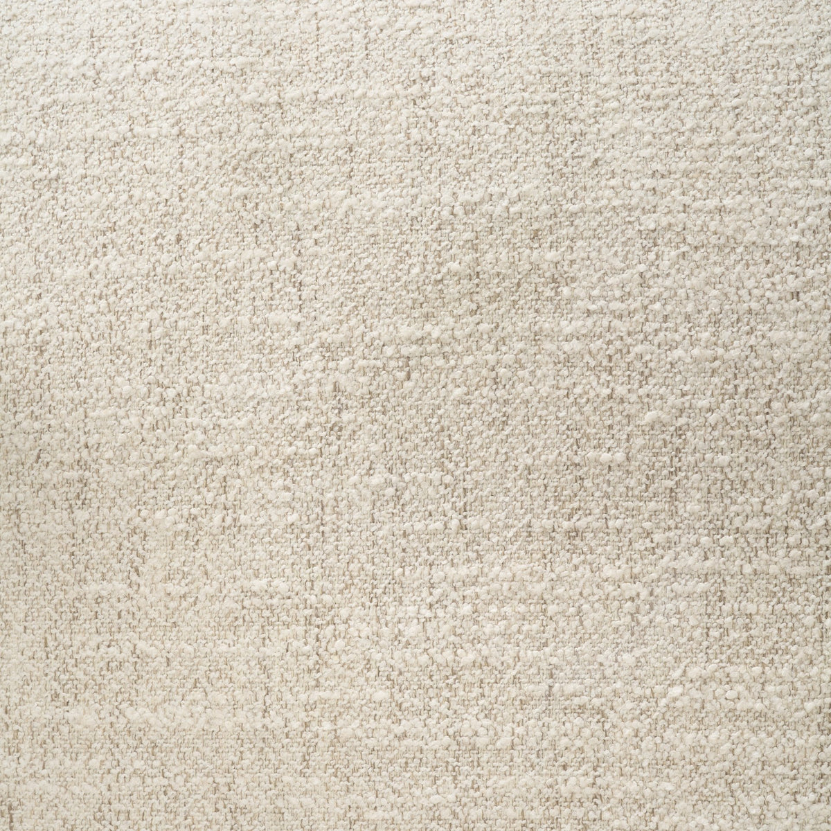 Close-up view of the high-quality cream bouclé fabric used on the Elodie barrel chair, showing its nubby, tactile texture.