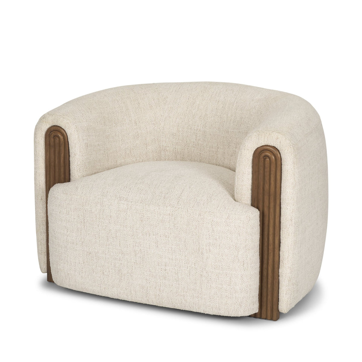 Angled studio view of the Elodie barrel chair showcasing its deep seat and seamless upholstered silhouette.
