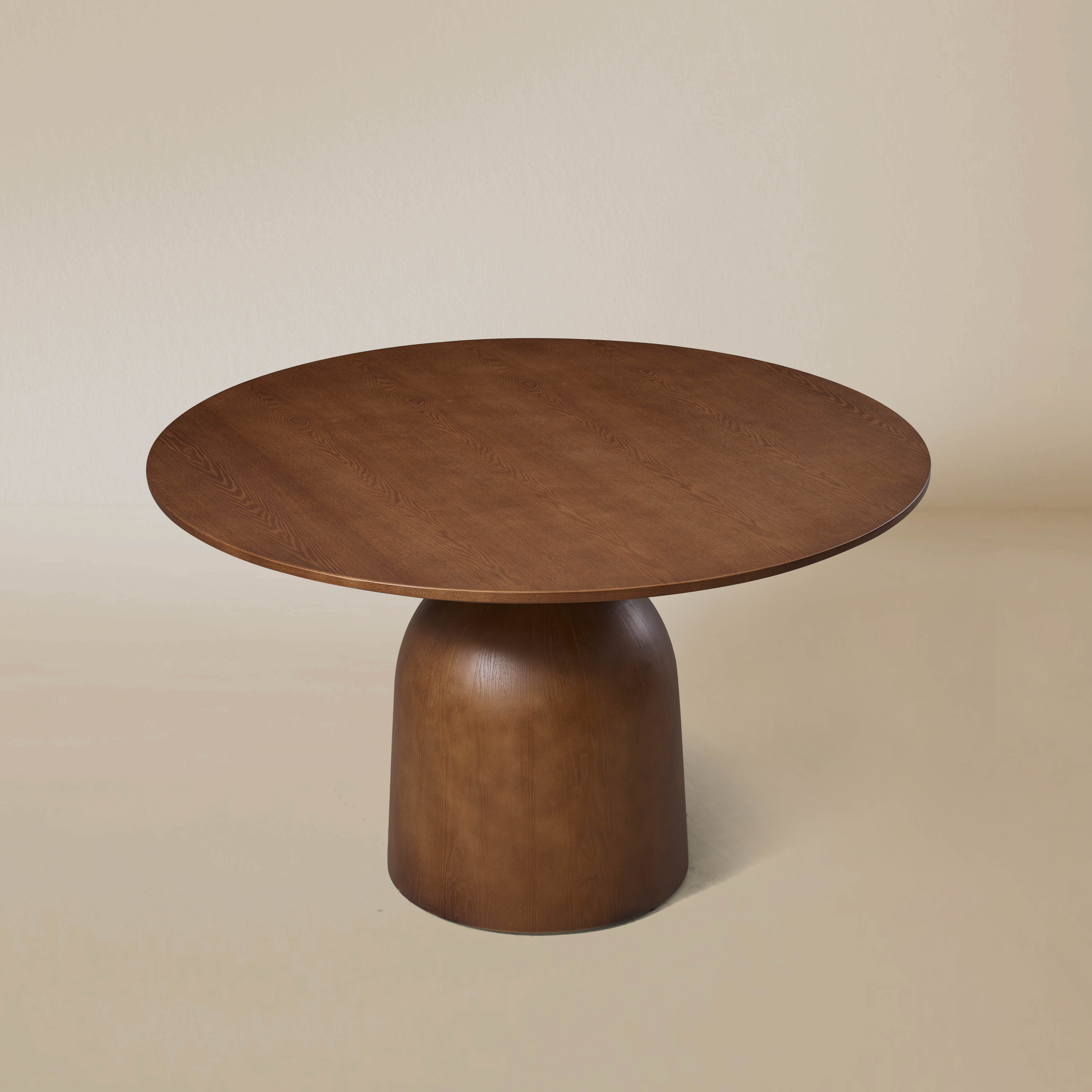 Top view of the Evelyn round walnut-finish dining table