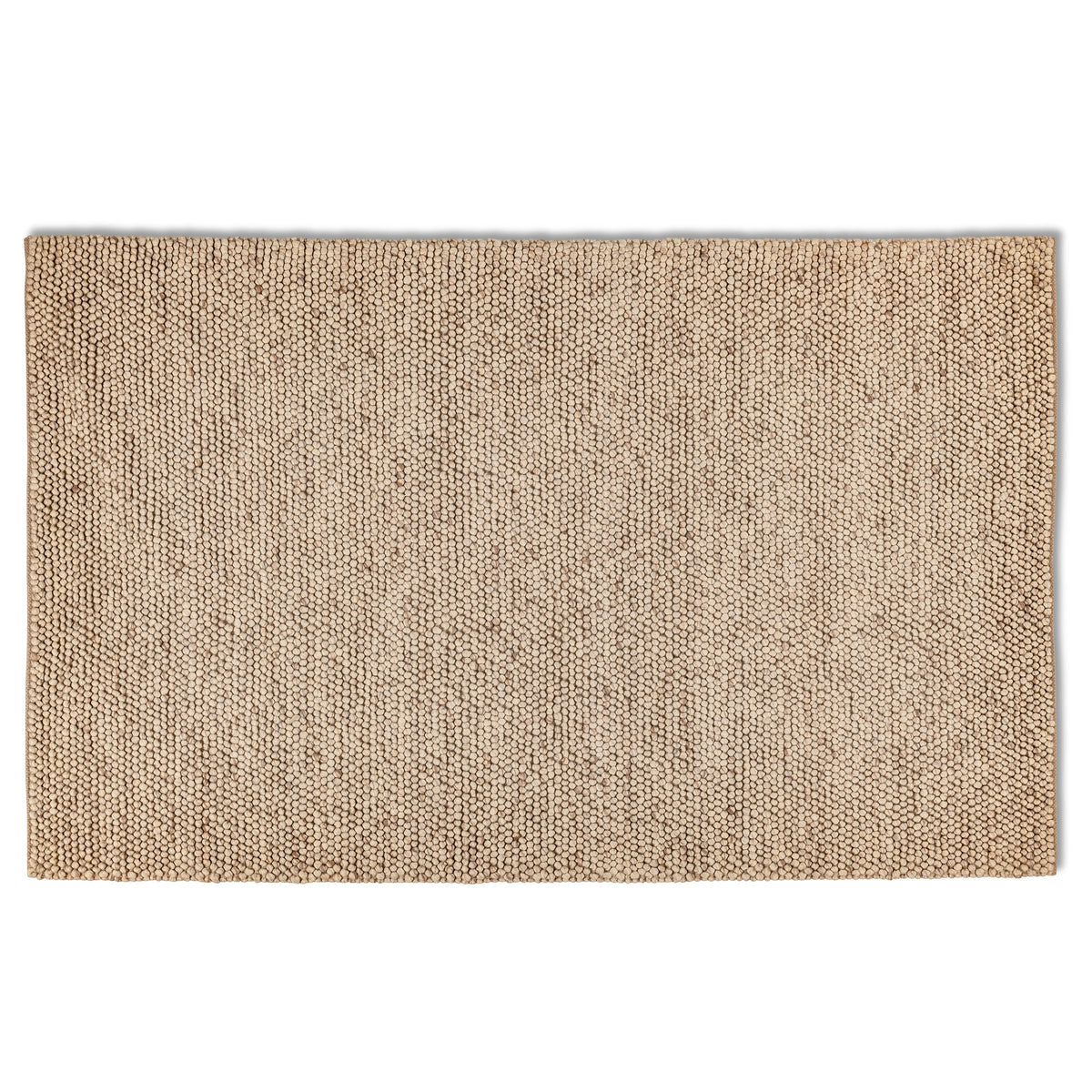 Full overhead view of the rectangular beige Felix handmade textured rug featuring a chunky, bobbled surface