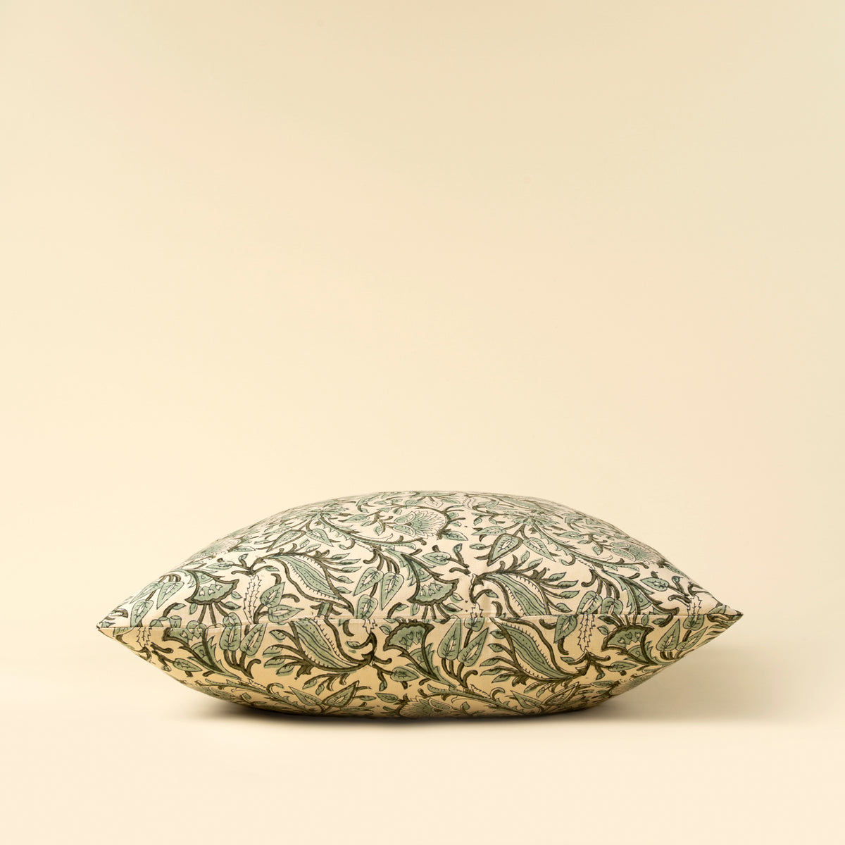 Fern Block Print Pillow – decorative pillow with green leaf pattern on a beige background