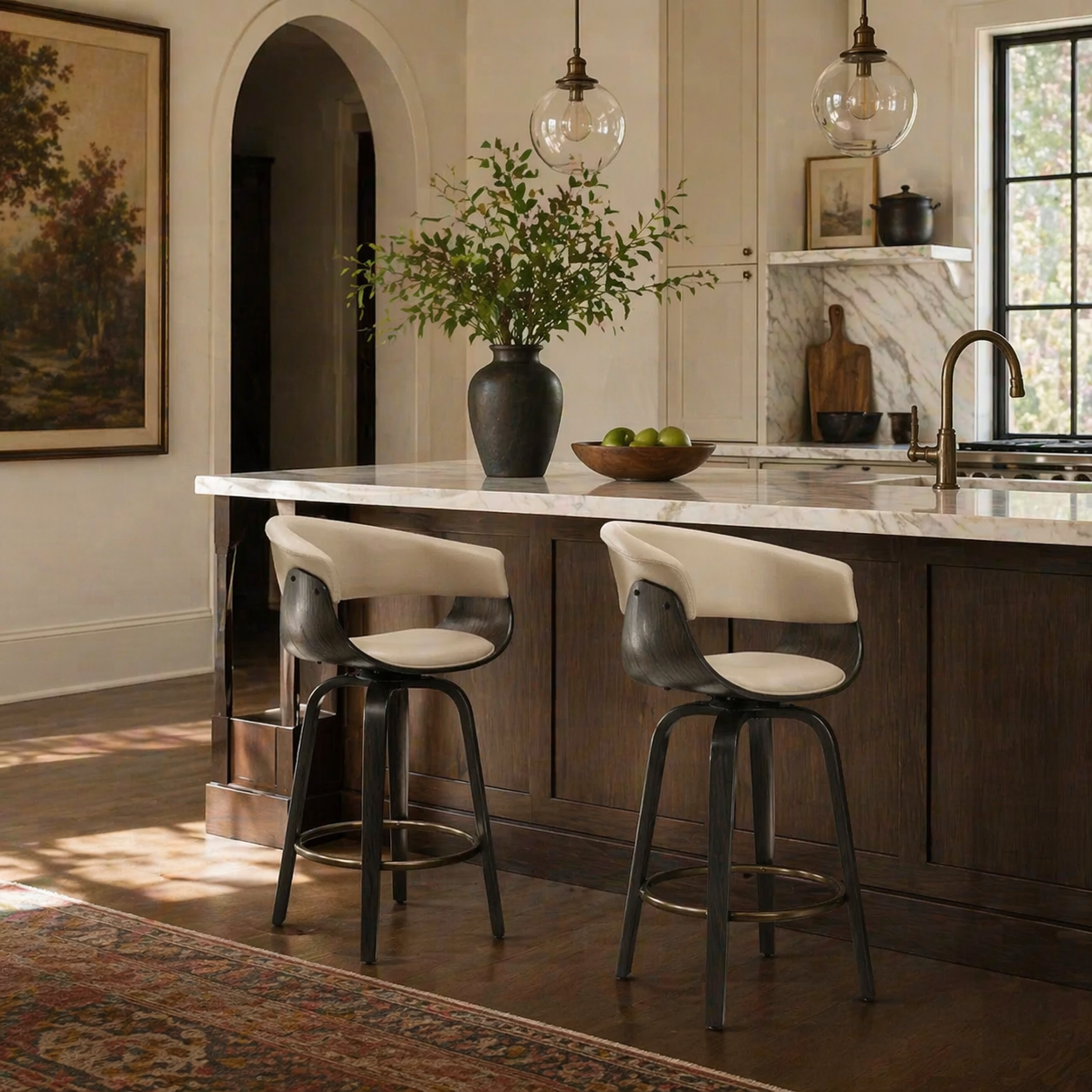 Modern kitchen with marble island, stools, and decorative elements.