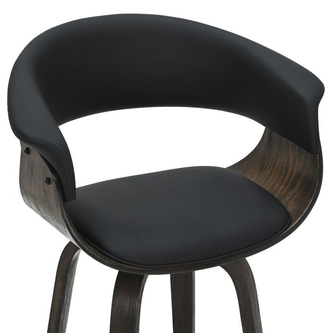 Close-up of the black Halo Counter Stool curved faux leather seat and walnut-toned wood detail