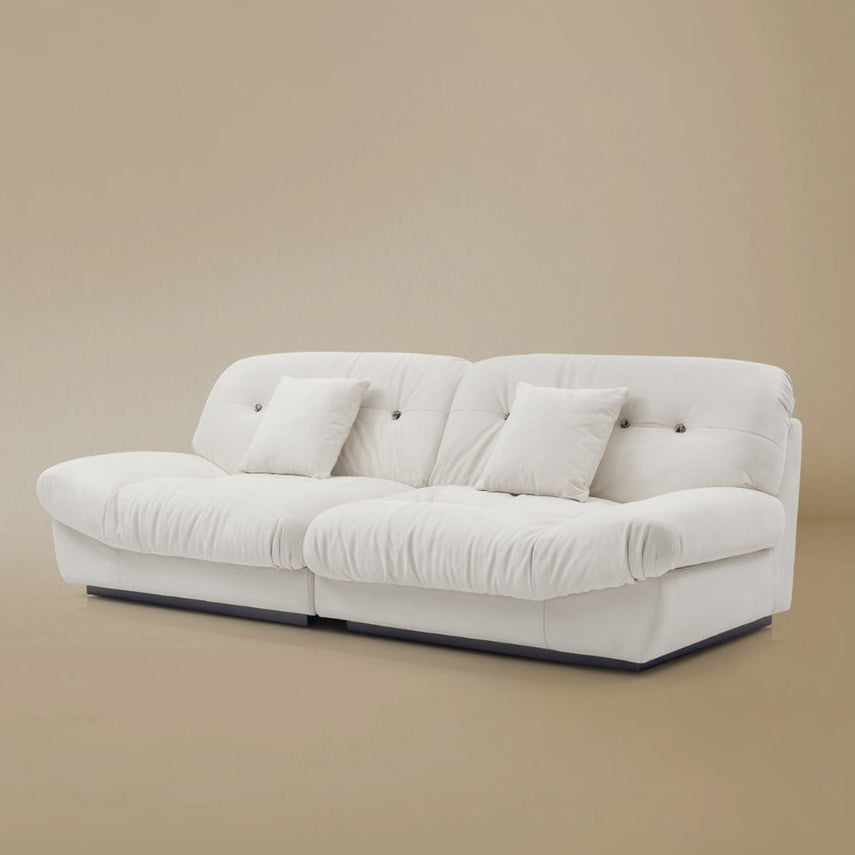 Angle view of the Italian Style Cloud Sofa in a light beige background