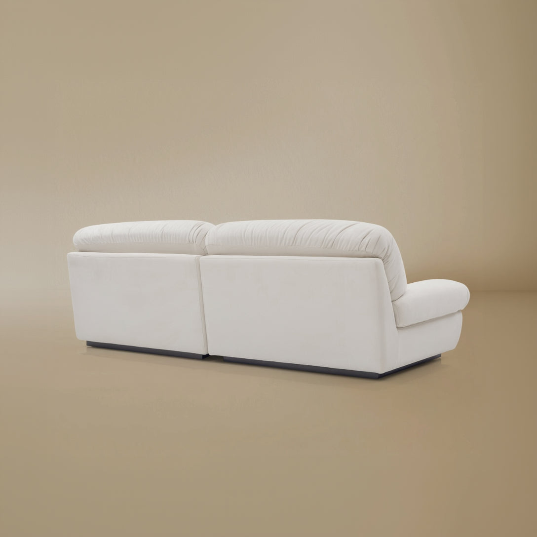 Back view of the Italian Style Cloud Sofa in a light beige background