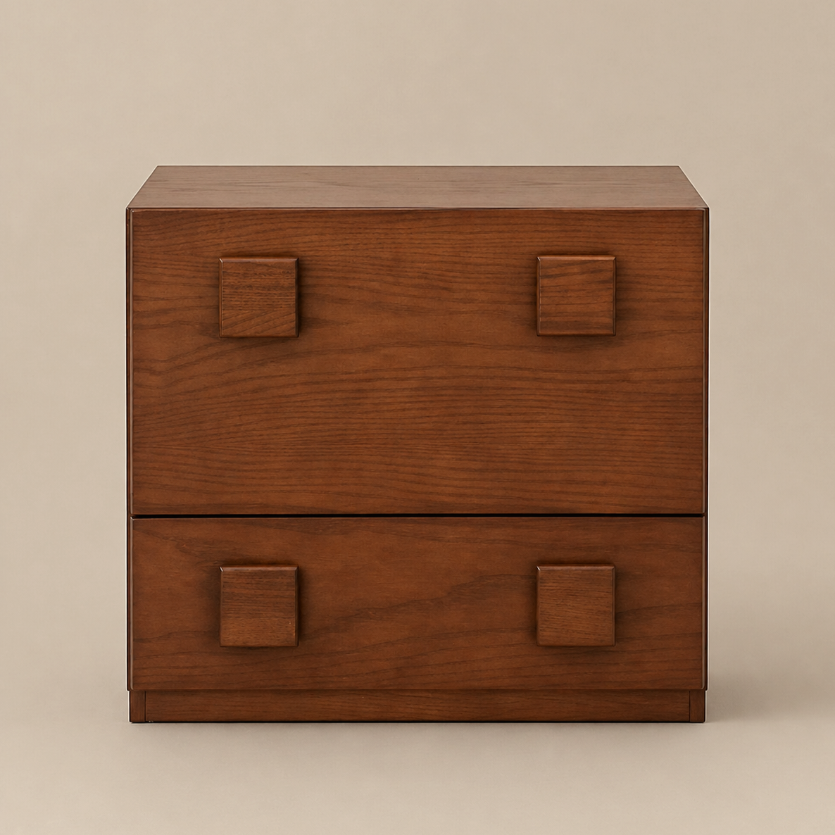 Wooden dresser with four square handles on a beige background
