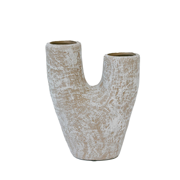 Decorative vase with a textured surface on a white background