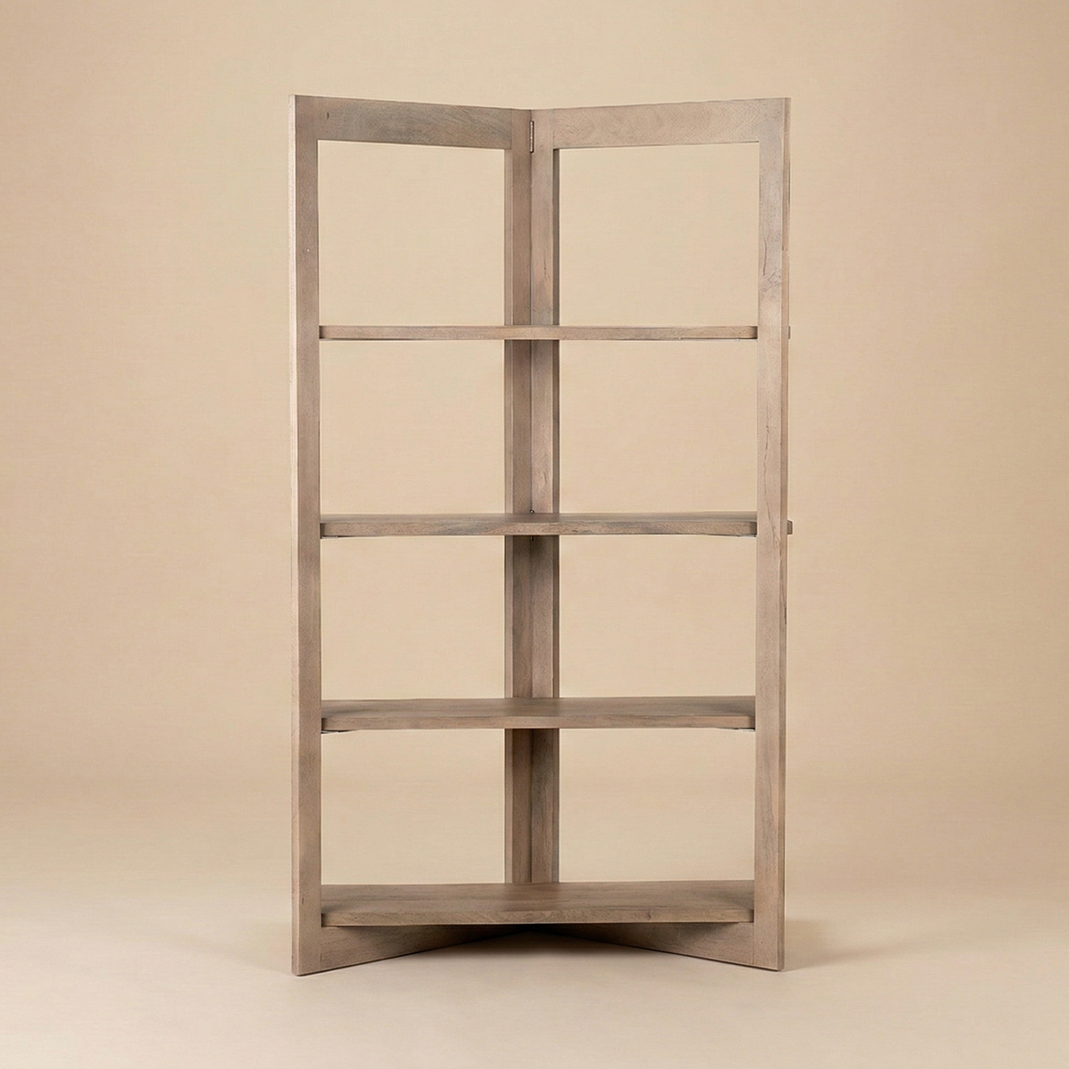 Full front view of the Kade wooden geometric shelving unit featuring five open tiers in a natural light wood finish.