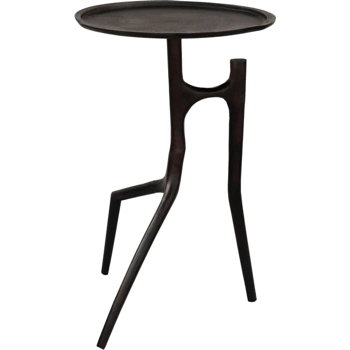 Modern side table with a round top and unique leg design on a white background