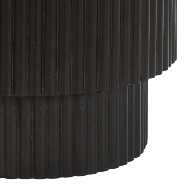 Close-up of the fluted wooden base on a white background