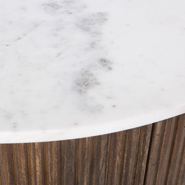 Close-up of the Kaia coffee table marble tabletop meeting a wooden base