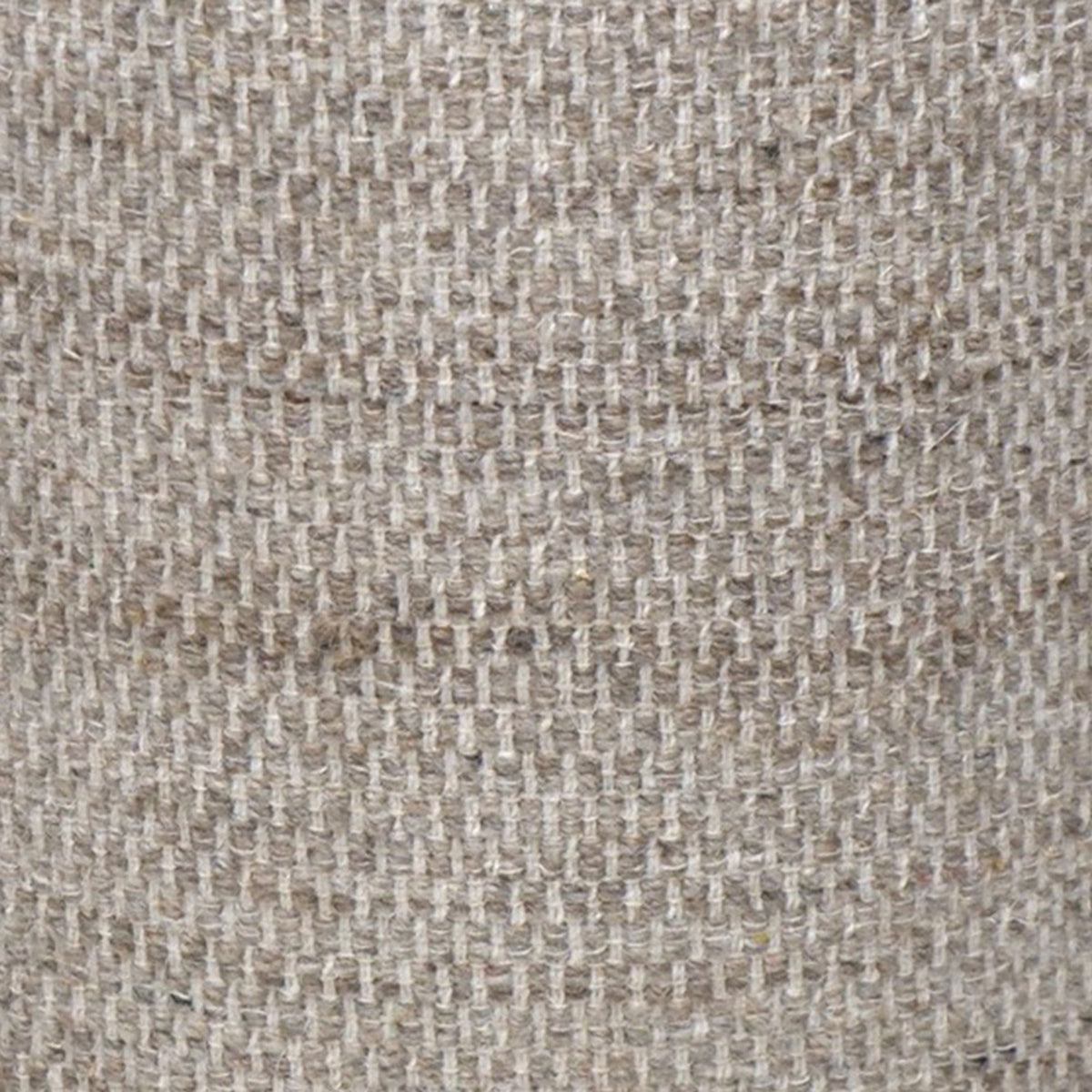 Close-up of a textured beige fabric surface