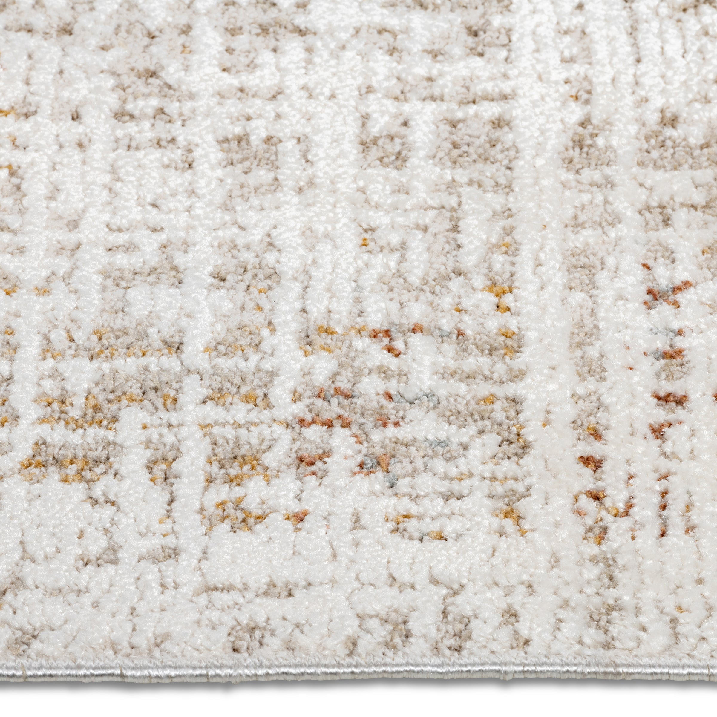 Close-up of the distressed abstract grid pattern featuring cream, grey, and rust tones on the Lennox area rug.