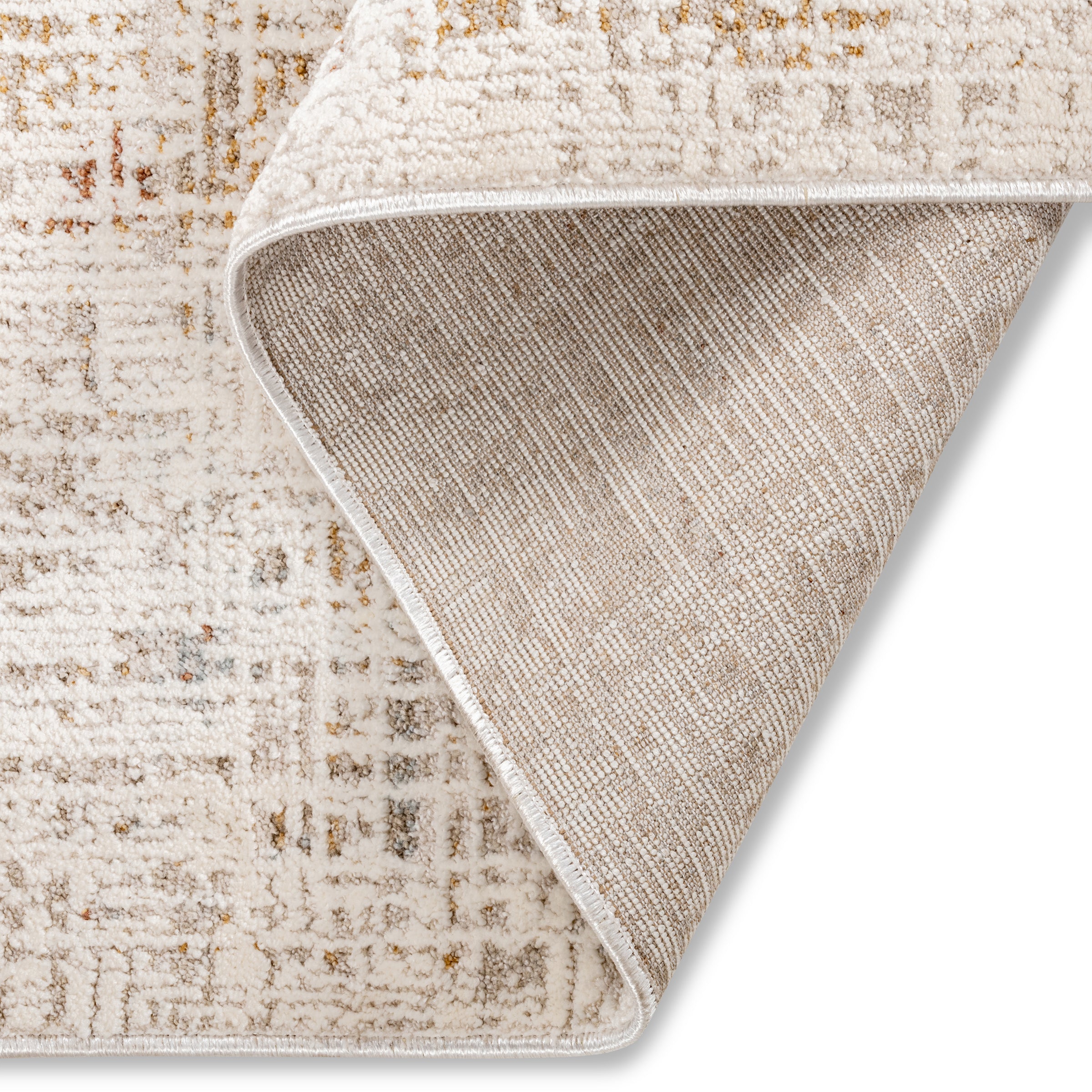 Corner view of the Lennox distressed abstract rug highlighting its tidy bound edges and modern artistic pattern.