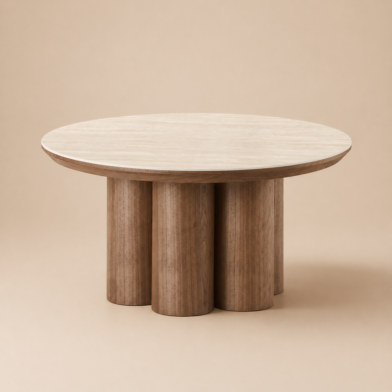 Full view of the Lyric coffee table featuring a round cream sintered stone top and walnut finish clustered cylinder base.